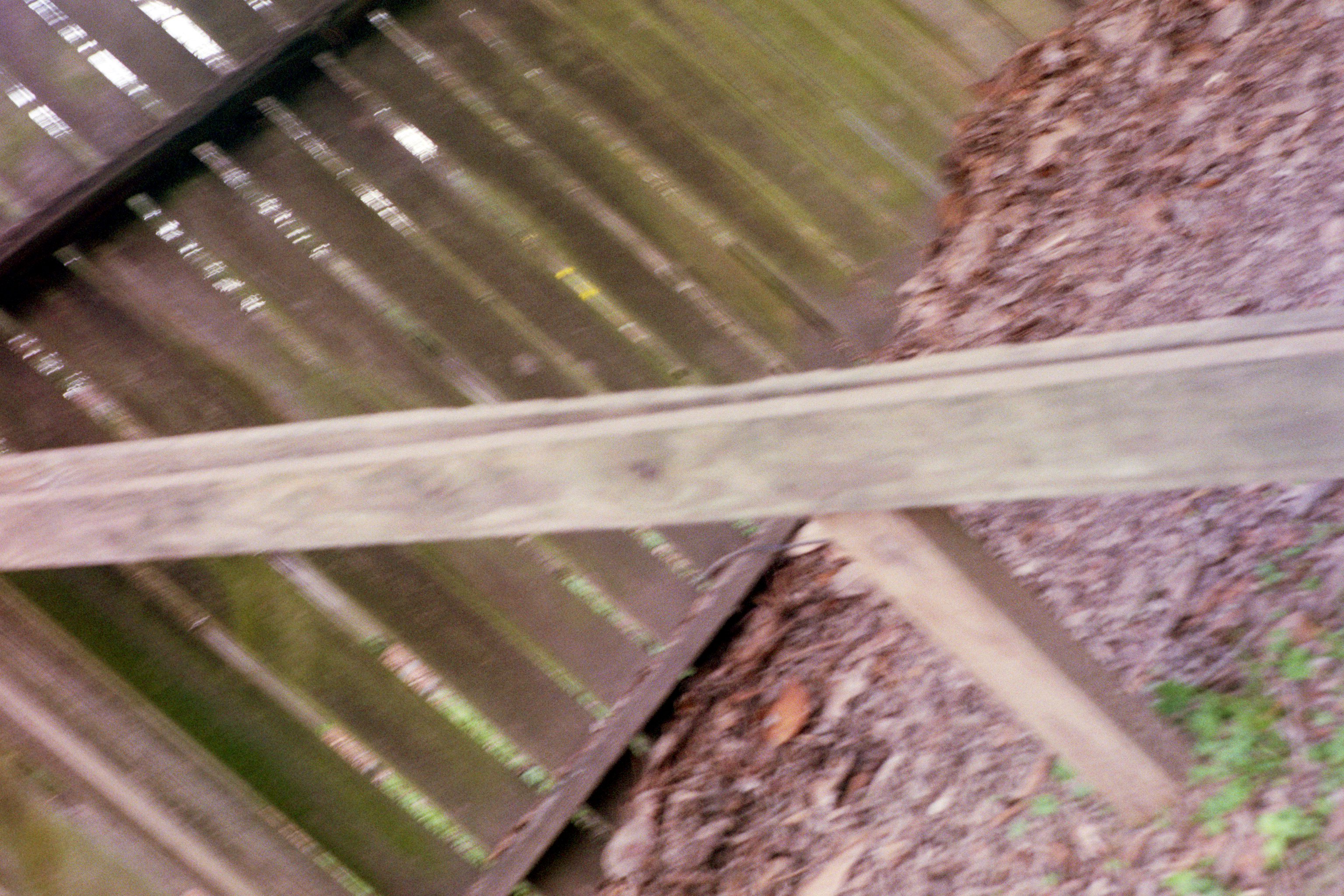 The beam keeping the fence up in the back